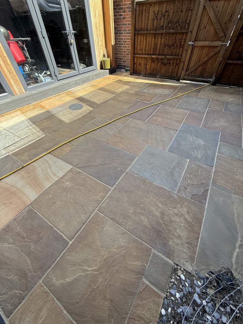 Warm multi-tone Indian sandstone, cleaned to a deep, rich finish.