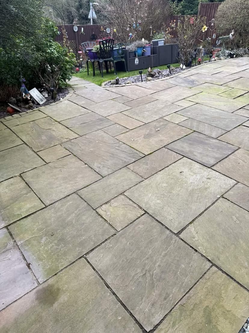 Sandstone patio cleaned right back to colour, ready for re-jointing.
