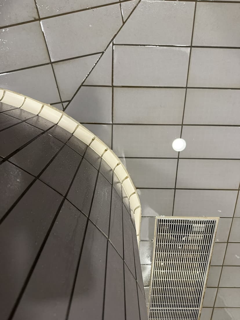 Poolside at Oundle Sports Centre — tiles and drainage channel after the deep clean.