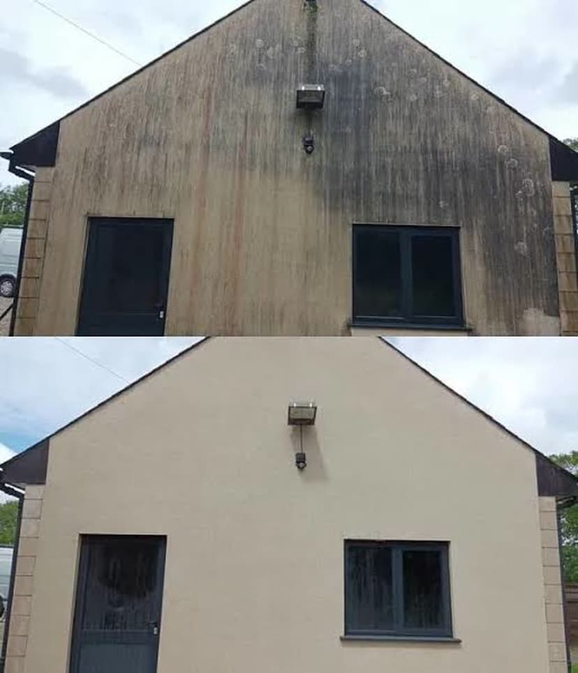Soft-wash render clean on a gable end — green growth gone, even finish restored.